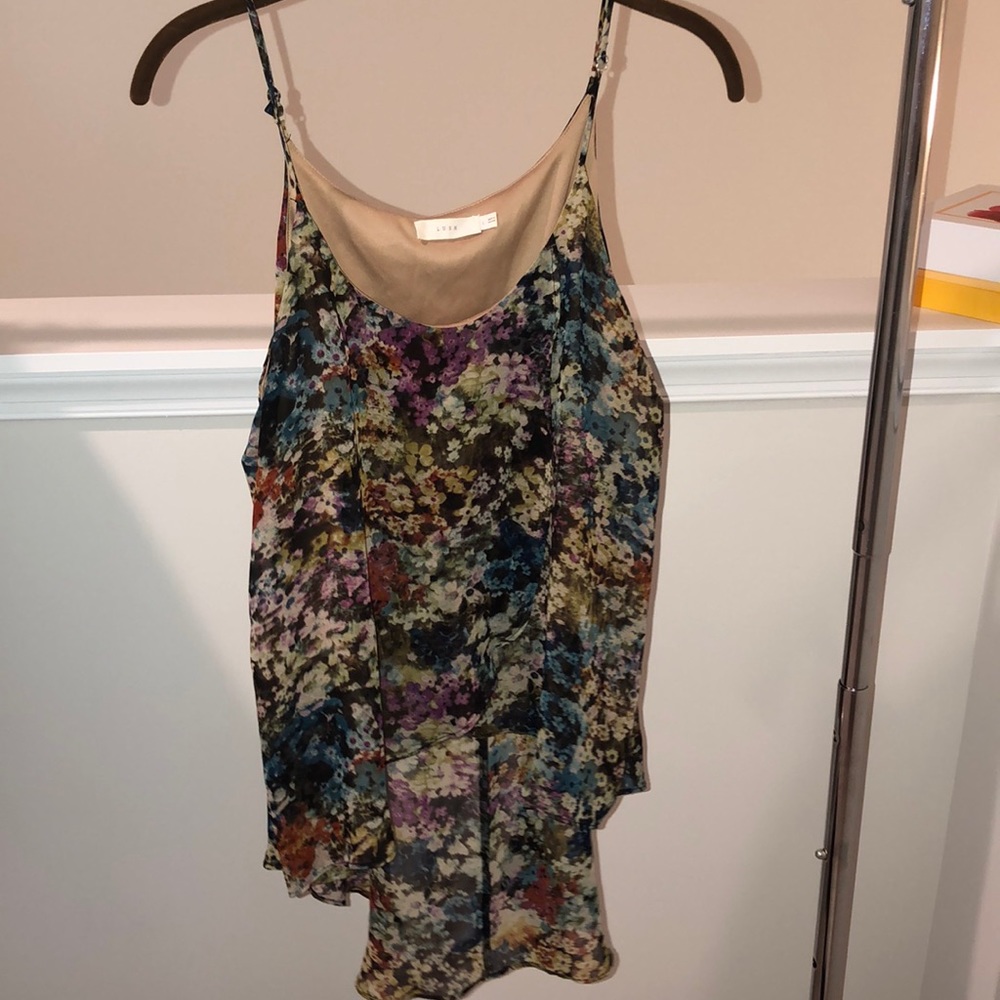 Lush floral sheer tank. High low with overlap!